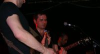 Band auf hell erleuchteter Bühne, Quelle: DTF