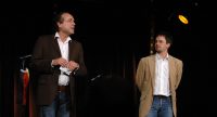 zwei Männer sprechend vor Silhouette des Publikums, Quelle: DTF