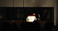 Schattentheater vor Silhouette des Publikums, Quelle: DTF