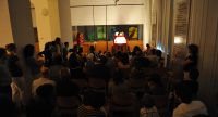 Schattentheater vor Silhouette des Publikums, Quelle: DTF