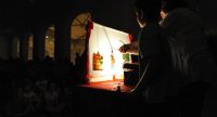 Schattentheater vor Silhouette des Publikums, Quelle: DTF